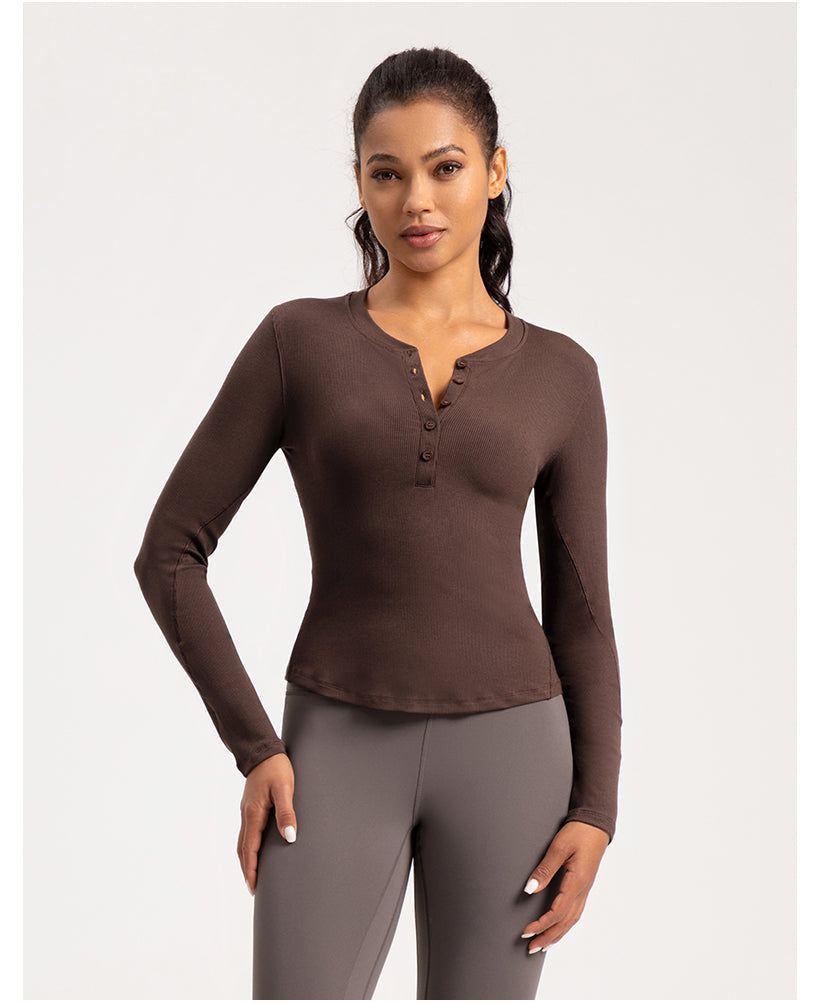 Front view of chocolate brown Infinity Modal Henley Long sleeves Shirt with buttoned neckline, paired with gray leggings for activewear.