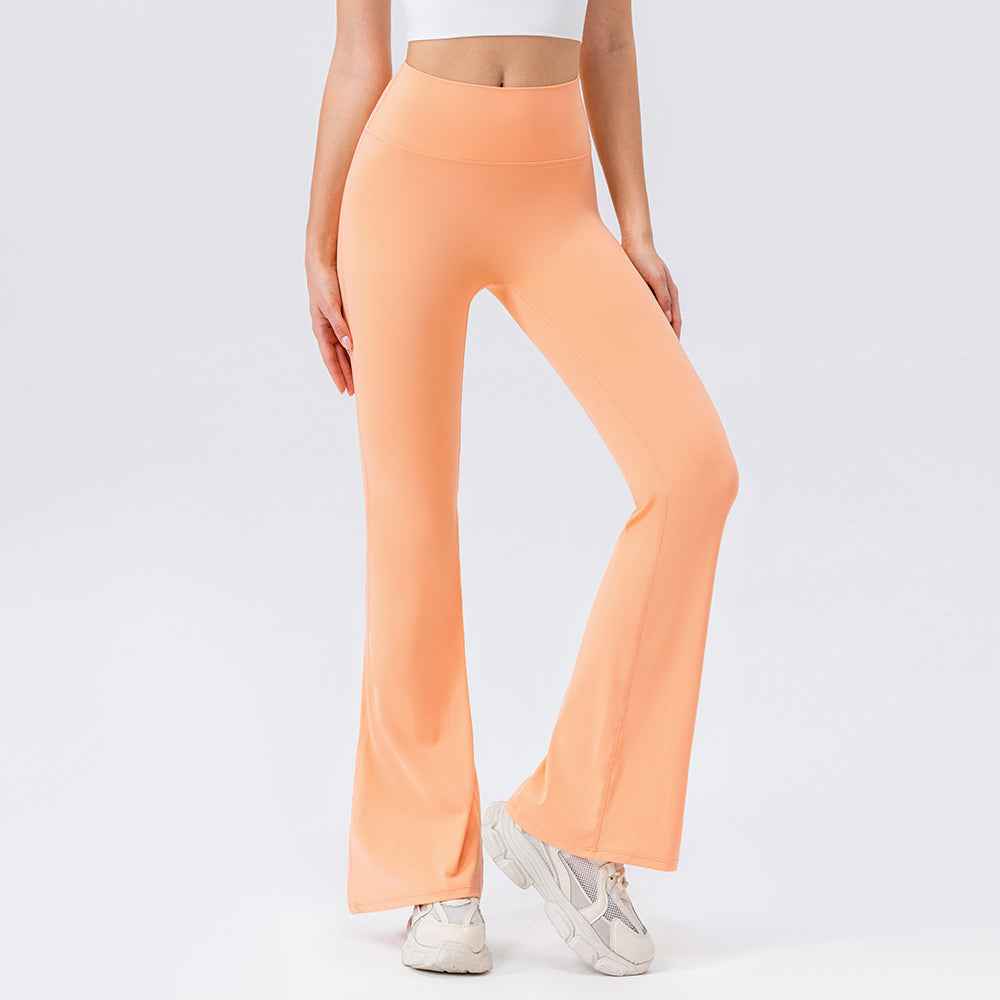 Seamless High-Waist Flared Lycra Leggings for Yoga & Pilates in peach orange, offering a sleek, seamless look with breathable stretch.