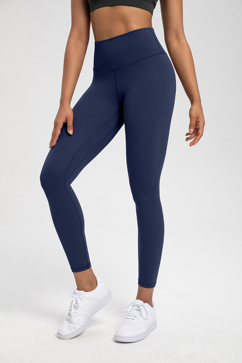 Navy high-waist naked feel Lycra leggings for yoga and Pilates, designed with a seamless waistband and flexible stretch for activewear support.