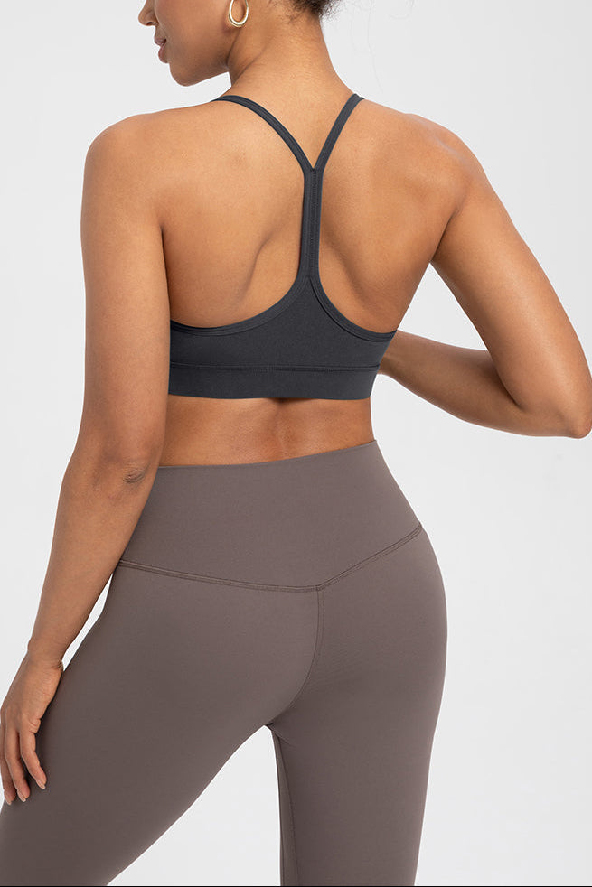 Back view of Comfort Zone Thin Strap Sports Bra Top in black, featuring 4-way stretch Lycra and medium support for activewear performance.