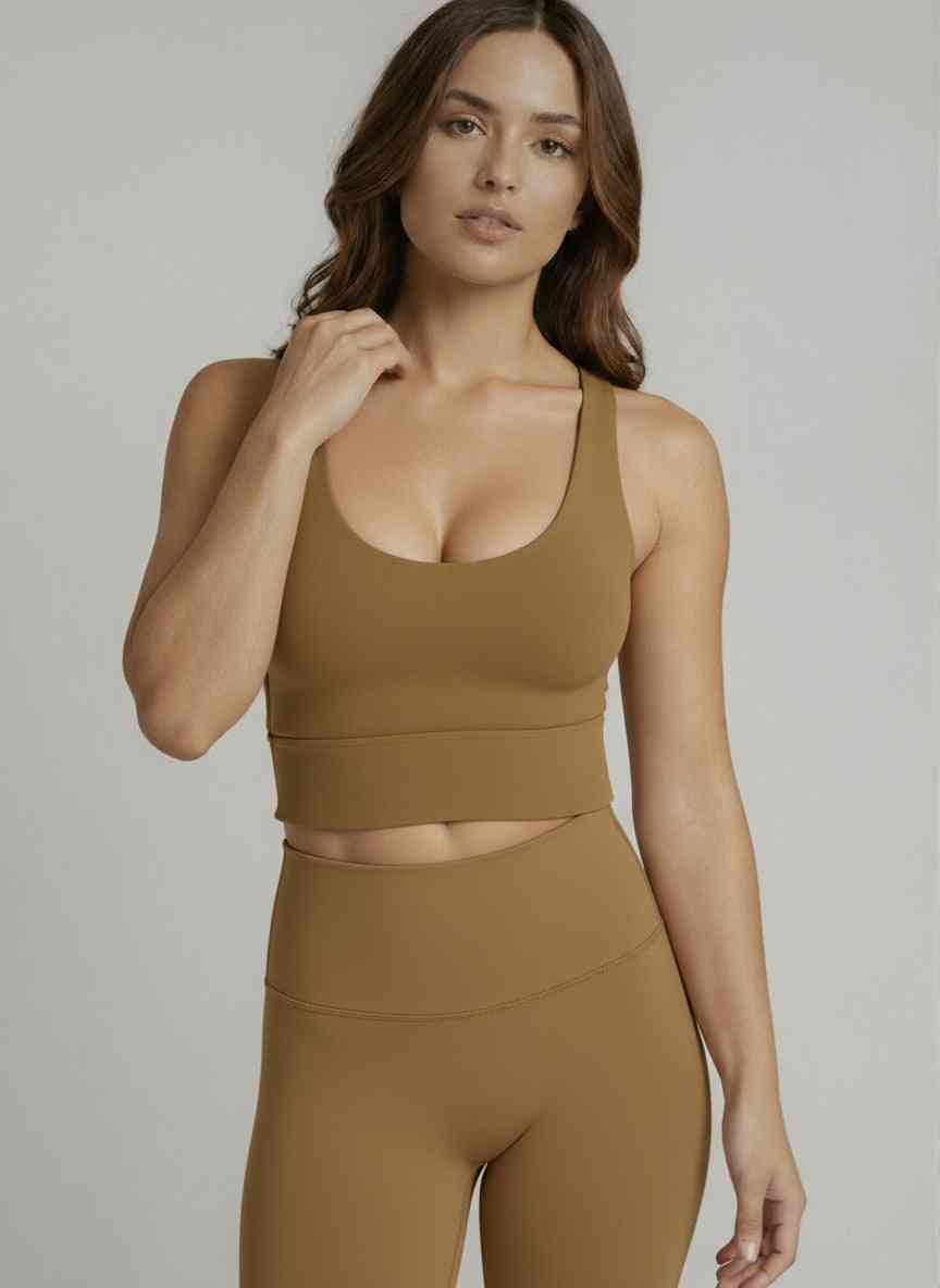 Supportive Racerback Sports Bra Top in camel brown with U-neck and sculpted fit. Designed for confident style and full coverage activewear comfort.