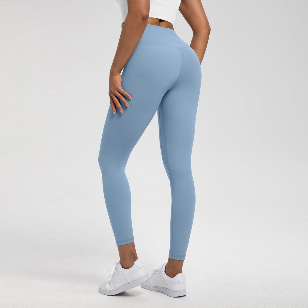 Back angle of light blue high-waist Lycra leggings, designed for yoga and Pilates with breathable fabric and flexible support for movement.
