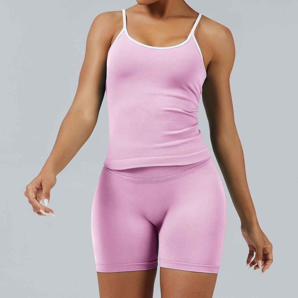 The Elevate Seamless Thin Strap Sports Bra Top in bubblegum pink, sleeveless with a scoop neckline and seamless construction for comfort.