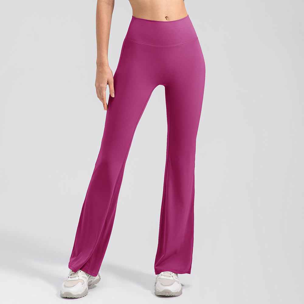 Fuchsia Seamless High-Waist Flared Lycra Leggings with high-rise waist and flared leg, perfect for yoga and pilates routines.