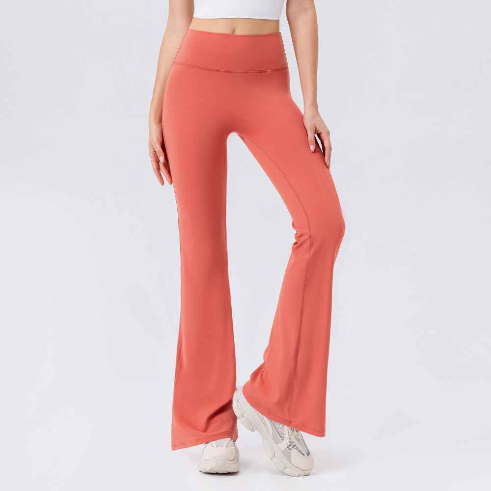 Seamless High-Waist Flared Lycra Leggings for Yoga & Pilates in coral pink, combining sculpting support with a soft, flexible fit.