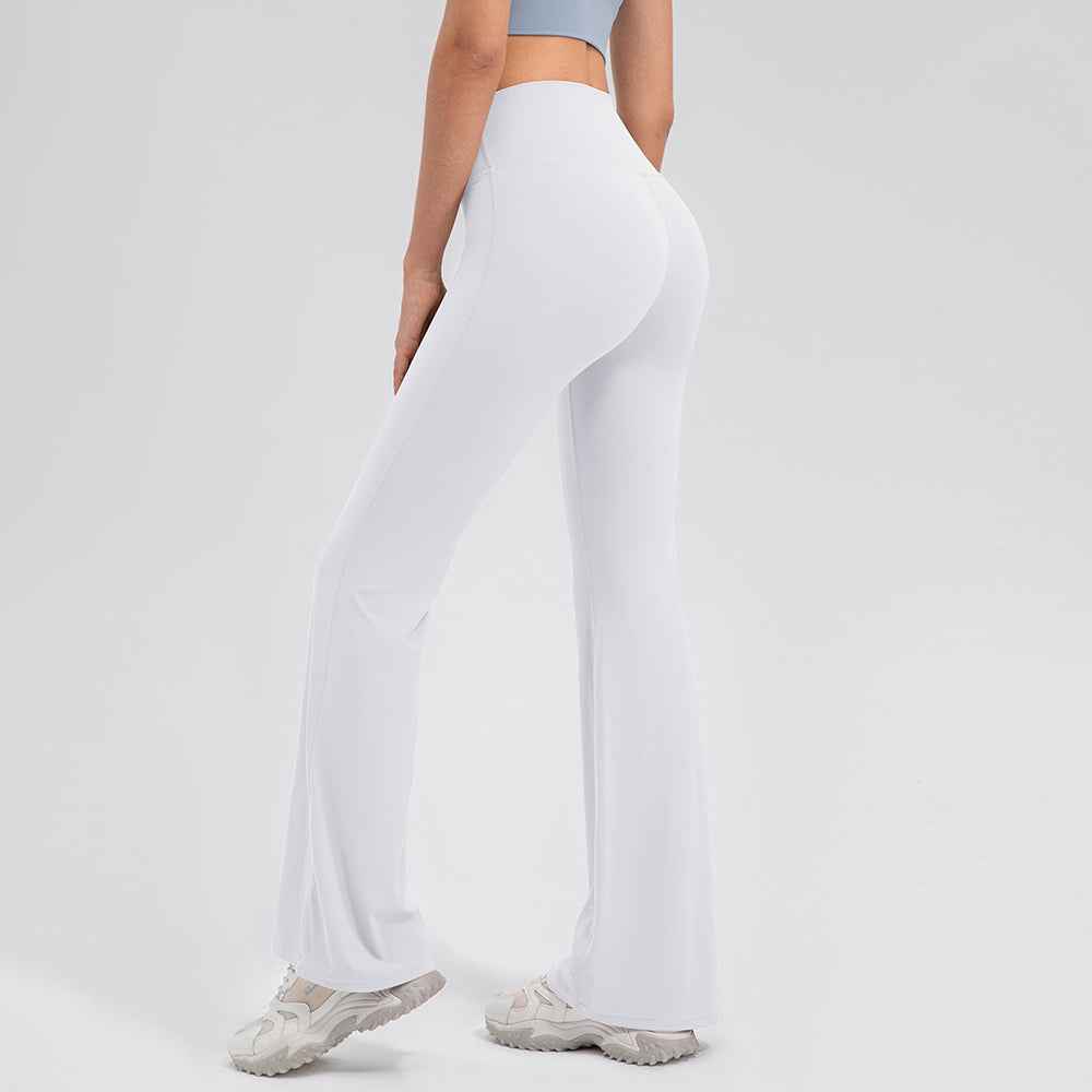Back view of white Seamless High-Waist Flared Lycra Leggings showing sculpted fit and airy stretch for yoga and pilates.