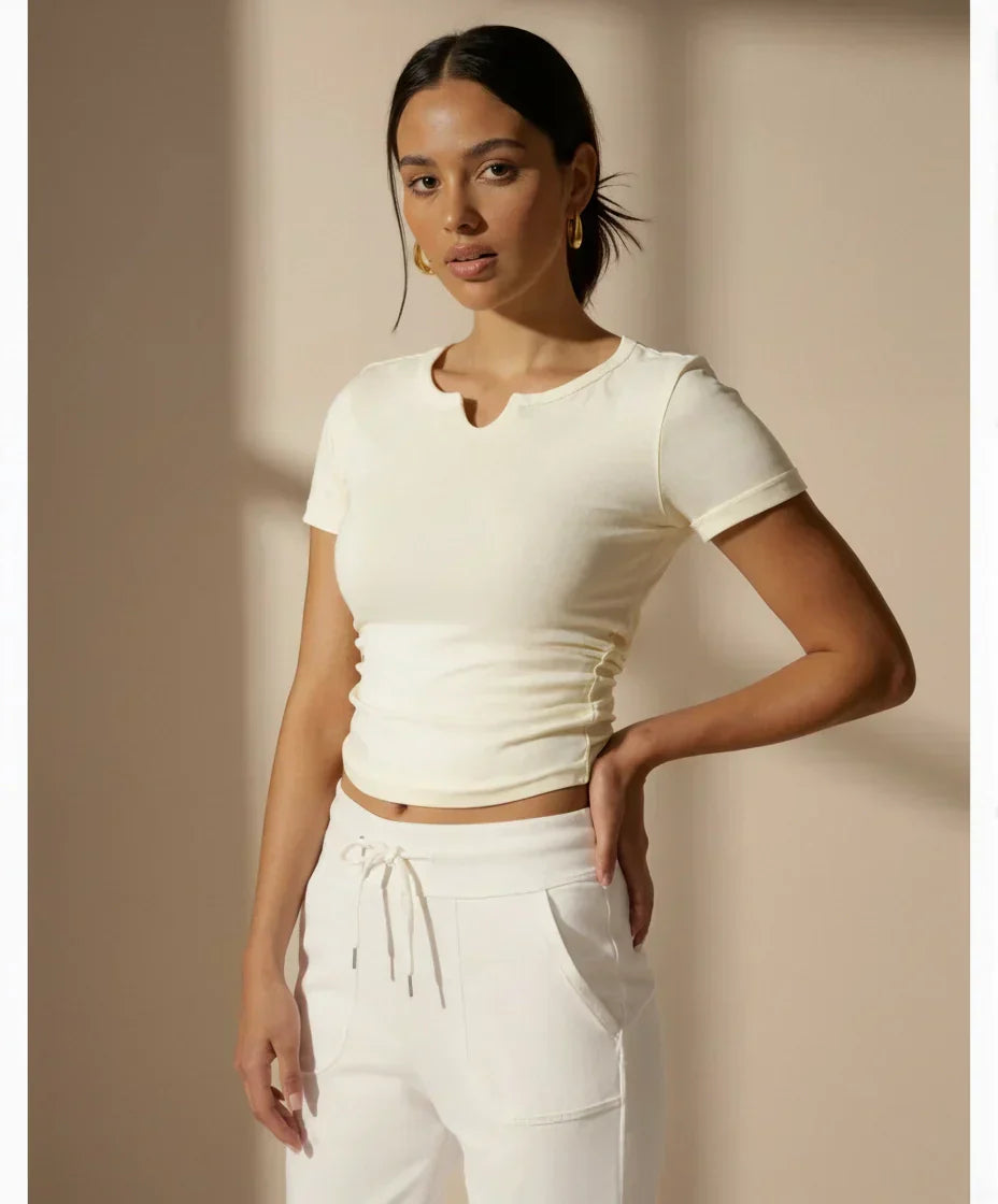 FLOW FLOW Top S (US 2-4) / Light Ivory The Slim Fit V-Neck Athleisure Ruched T-Shirt with Built-in Pads